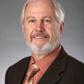 Studio portrait of distinguished looking mature Caucasian man.